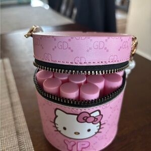 Hello Kitty carrier with beaded white handle
Hold 20 lip gloss NWOT